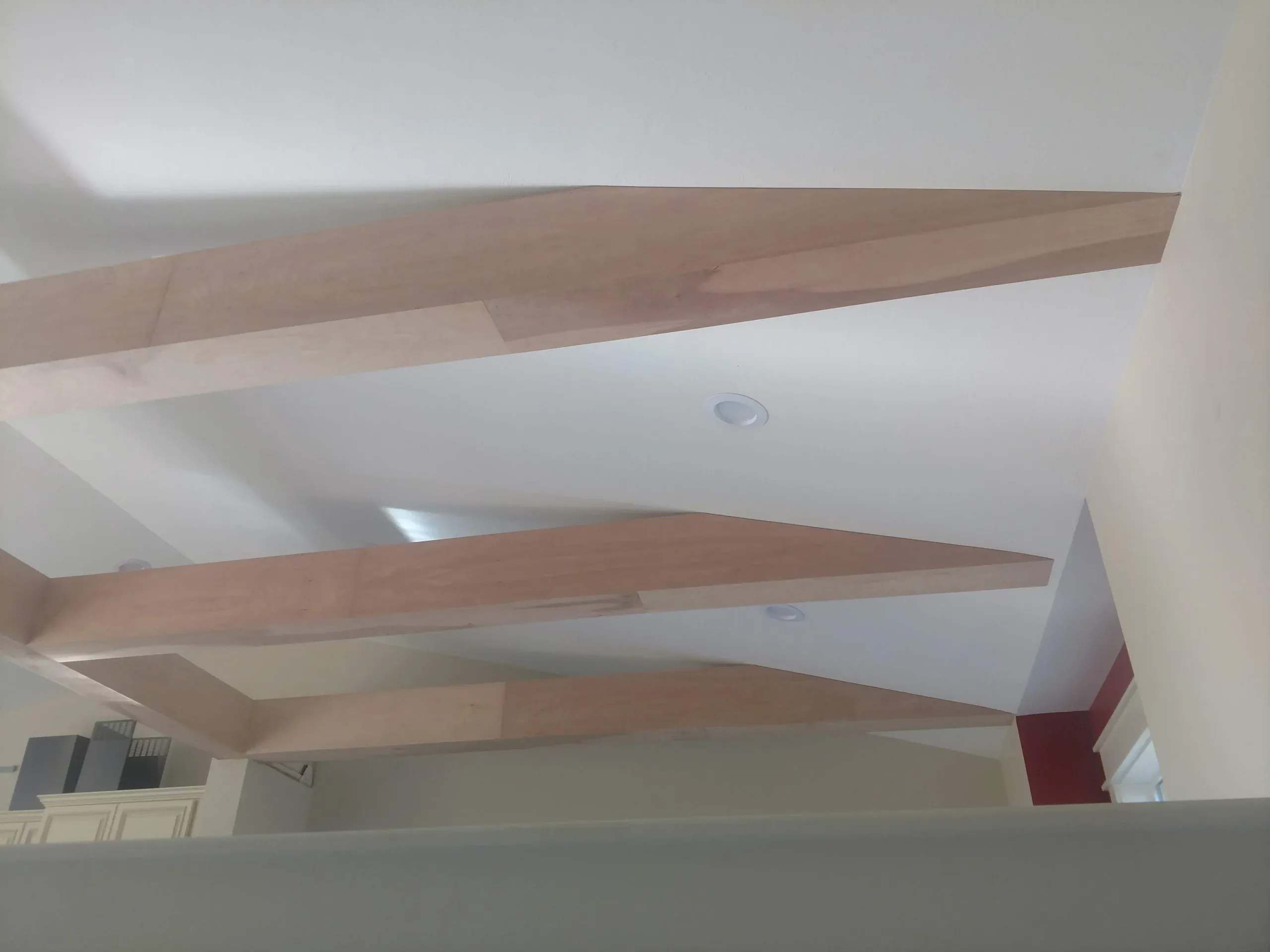 Vaulted ceiling with stained wood beams